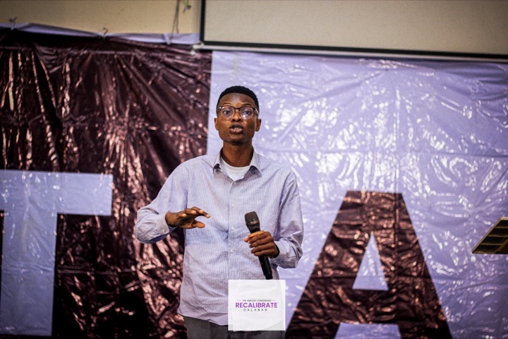 Emmanuel Umo at a MongoDB and AWS technology conference